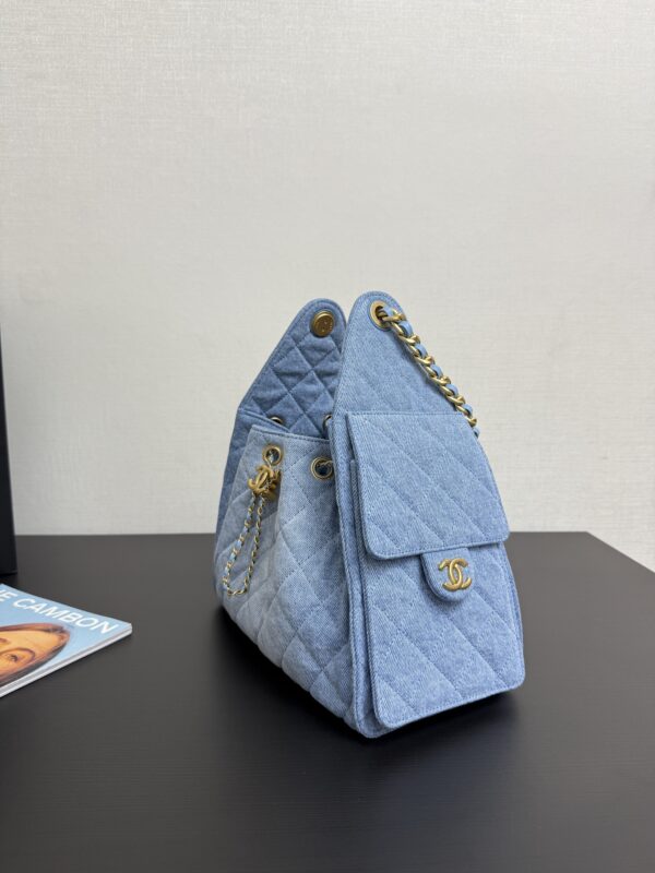 CHANEL 25 small denim handbag
